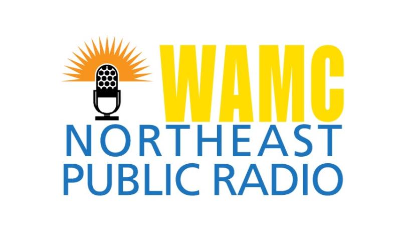 Logo with yellow text saying "WAMC" and picture of microphone